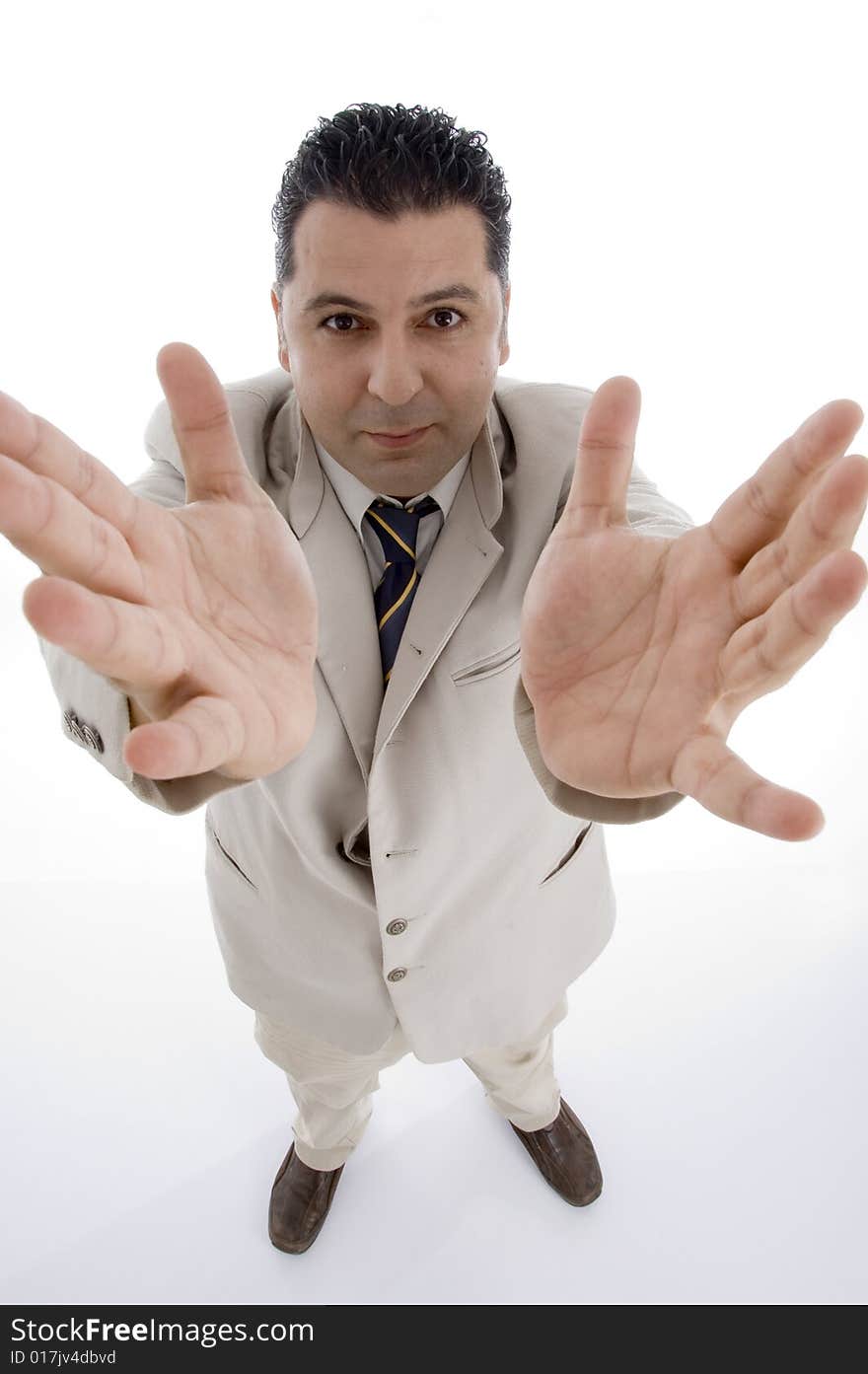 Standing businessman showing his palms on  an isolated white background