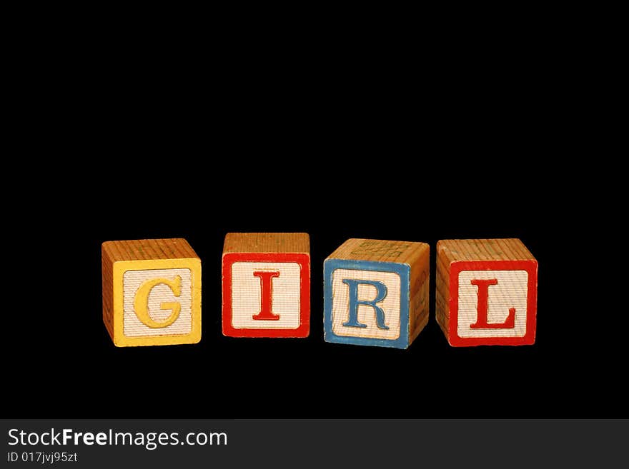 Four wooden baby blocks spell the word Girl with room for copy. Four wooden baby blocks spell the word Girl with room for copy.