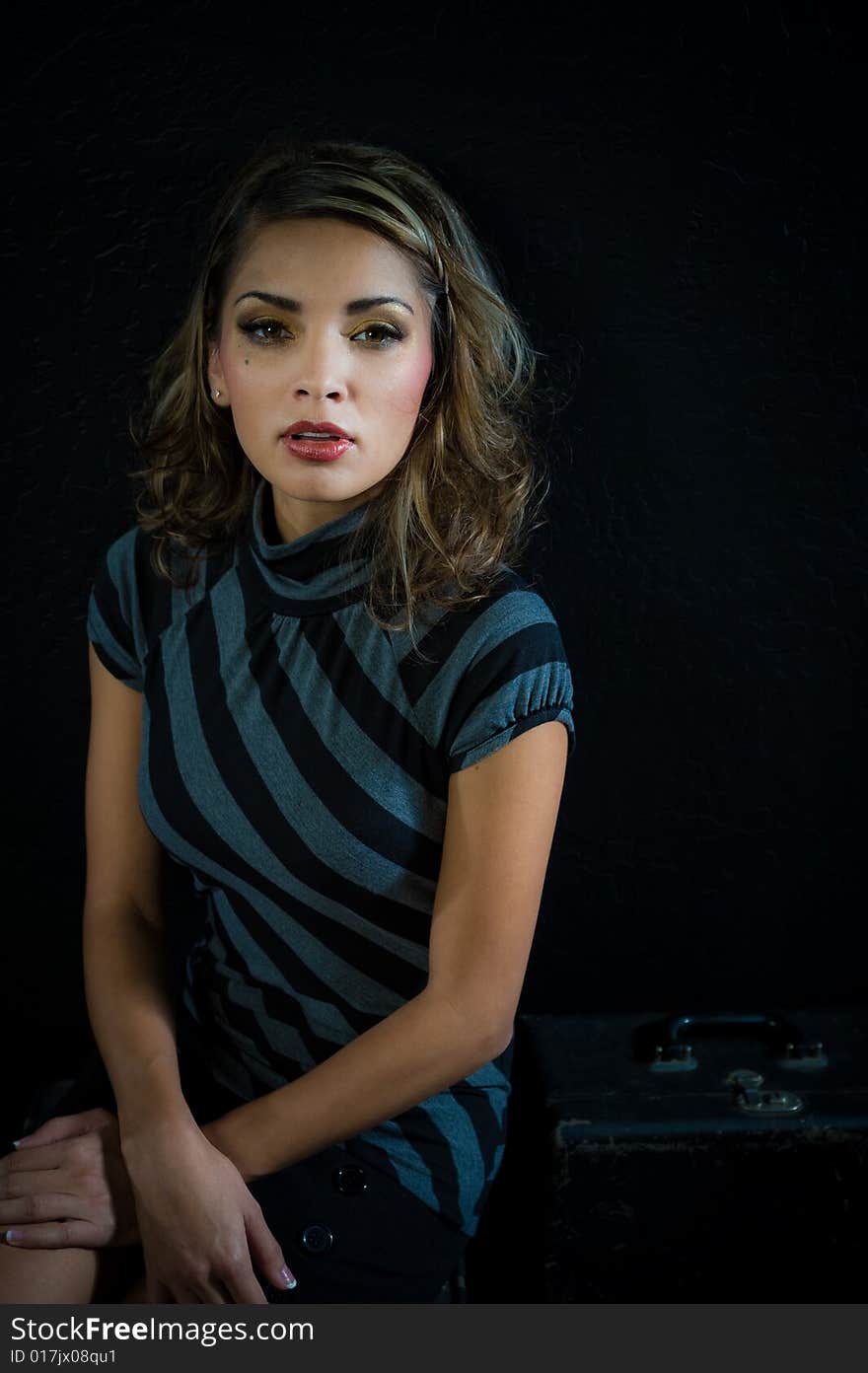 A young female model, photographed in the studio.