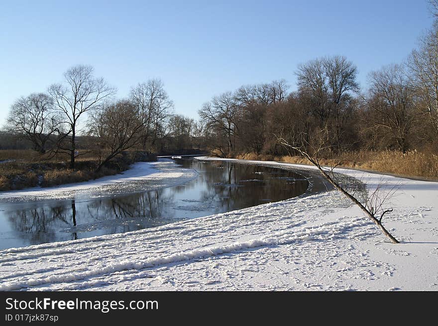 Winter Landscape. The frozen river. Winter Landscape. The frozen river