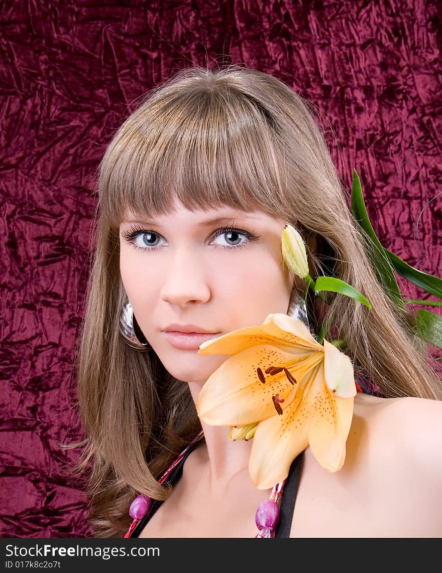 Beautiful angelic woman with a flower