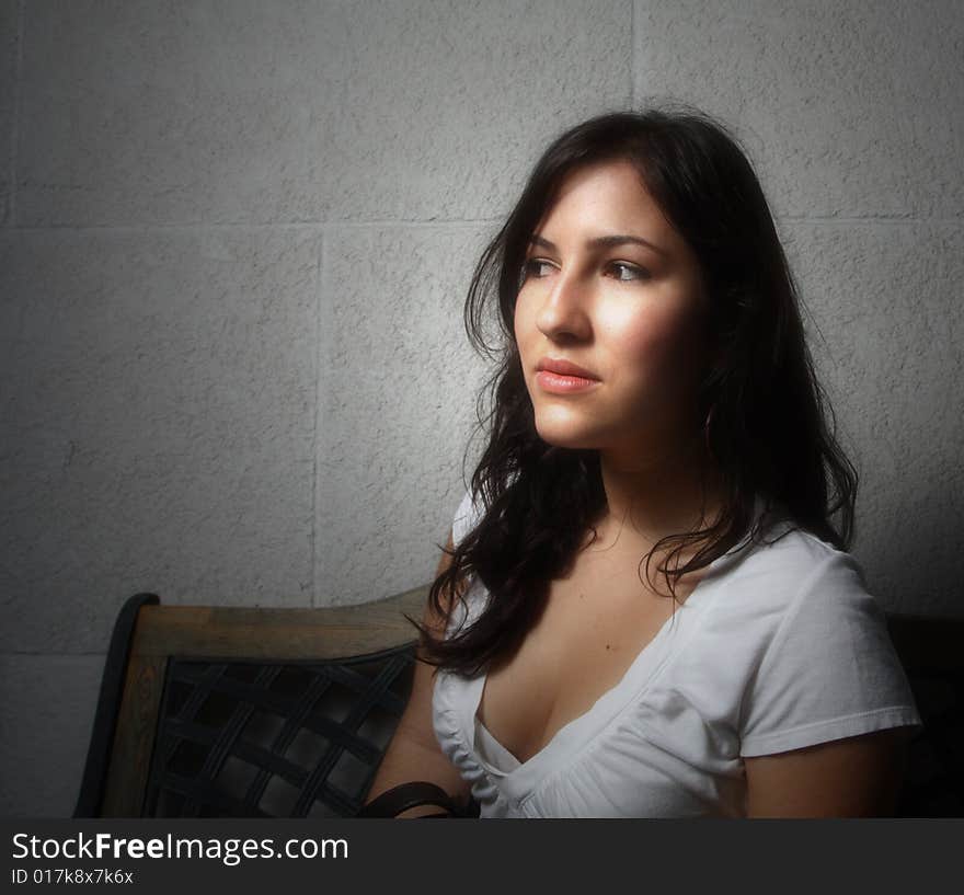 Image of a young female glancing away. Soft focus. Image of a young female glancing away. Soft focus