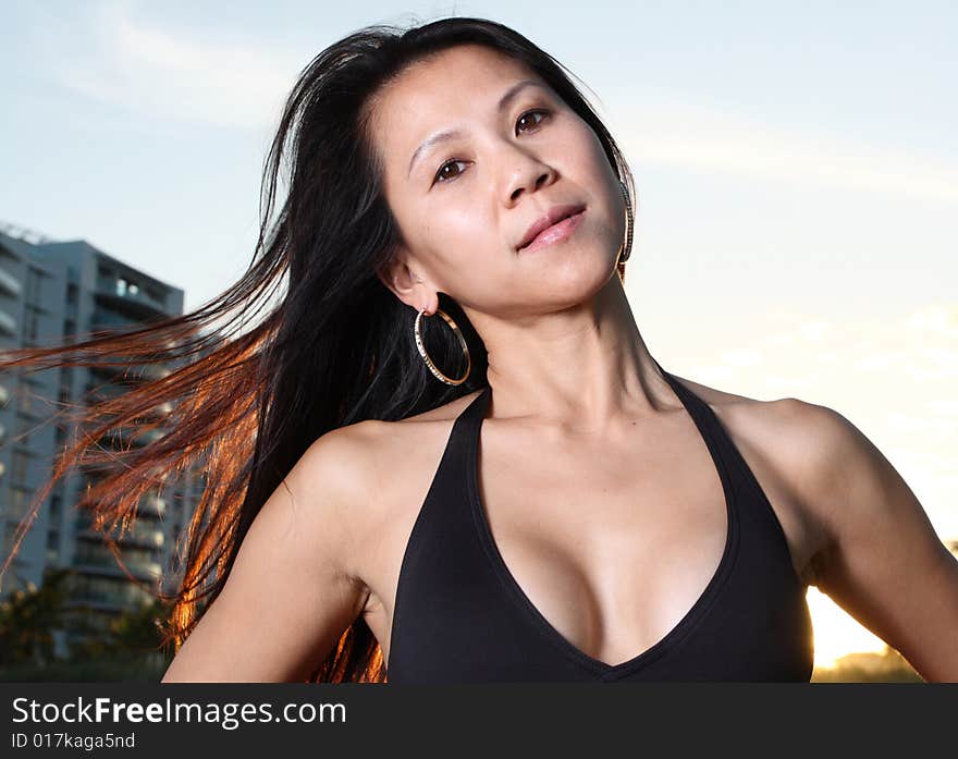 Upper body shot of a young woman in a bikini