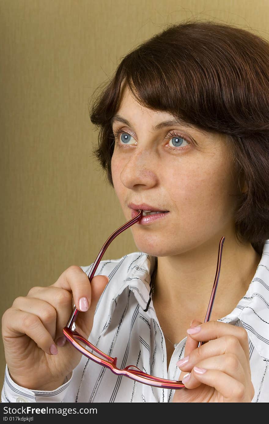 The thoughtful woman   keep glasses in the hands