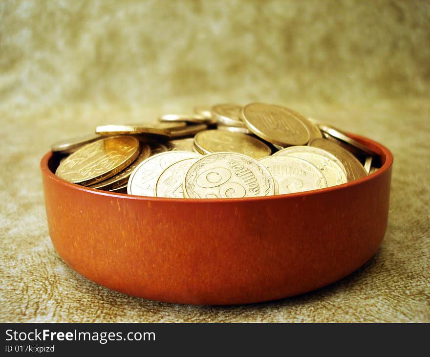 Golden coins in a box