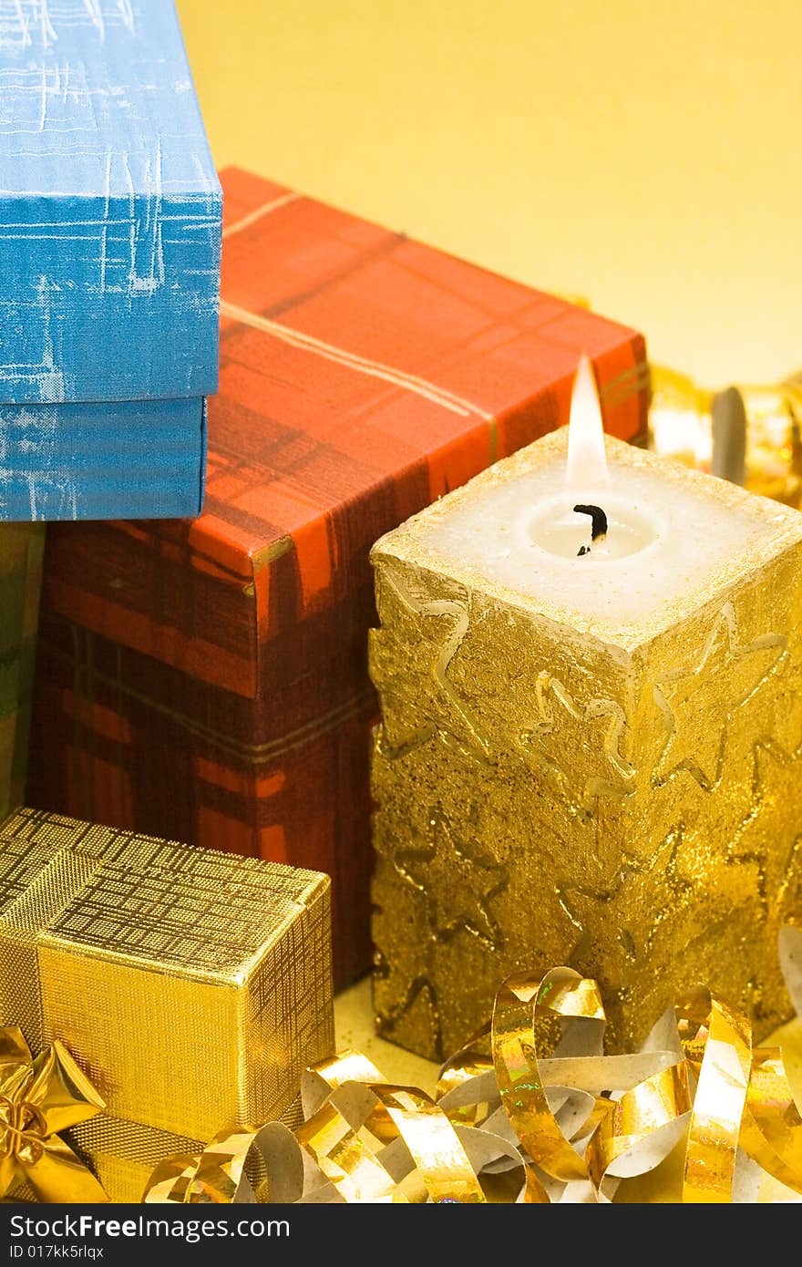 Gift boxes and candle