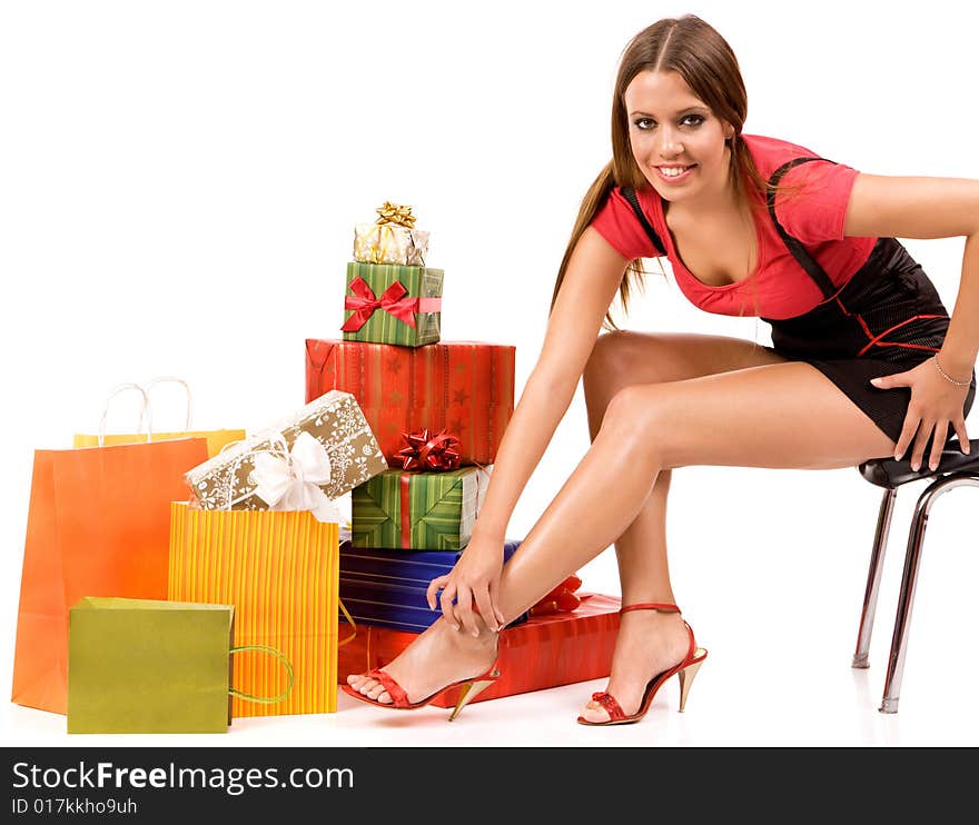 Attractive woman with many gift boxes and bags. Attractive woman with many gift boxes and bags.