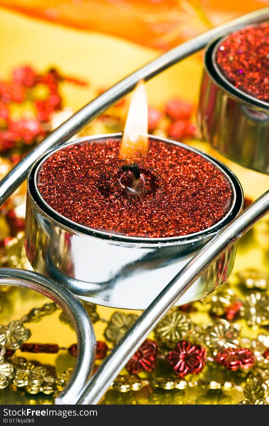 Red festive candles with ribbon