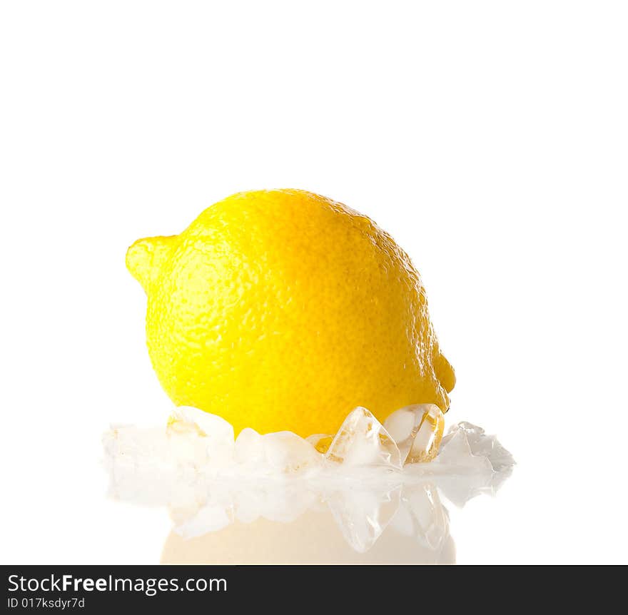 One lemon with ice, isolated on white, copy space for the text