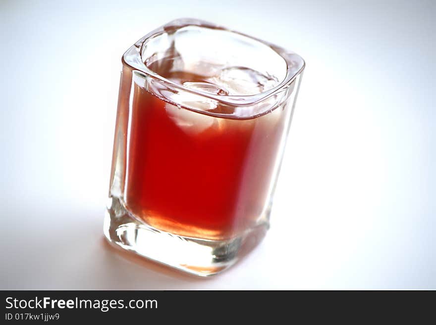 Drink with ice on white background