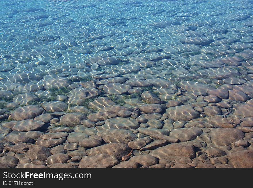 Lake ripples reflecting sunlight off the surface