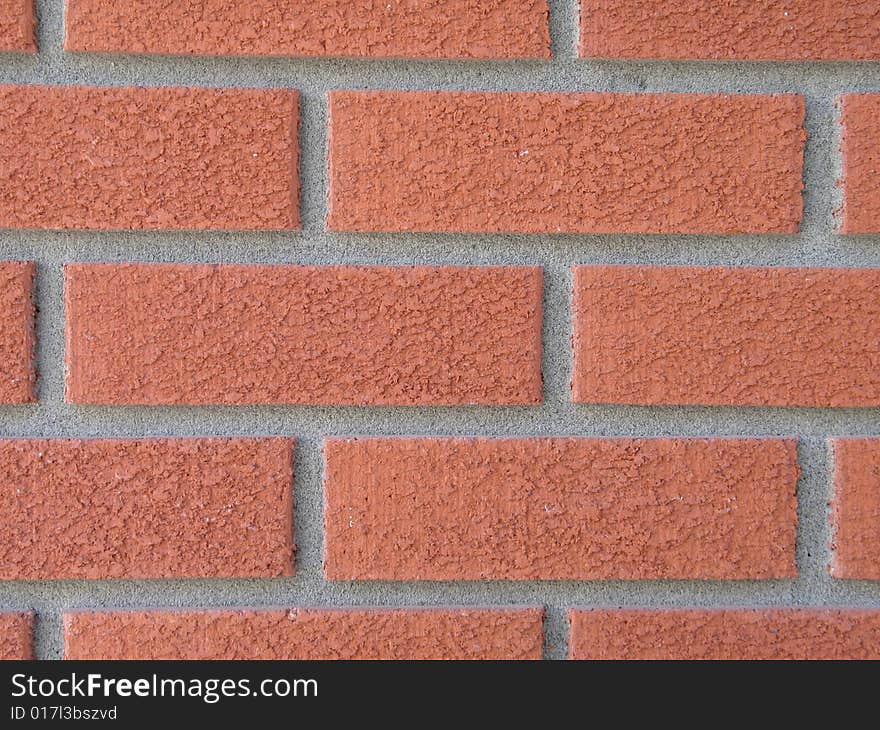 Orange brick wall close up