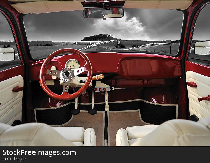 Interior of the red Trabant car on a highway. Interior of the red Trabant car on a highway