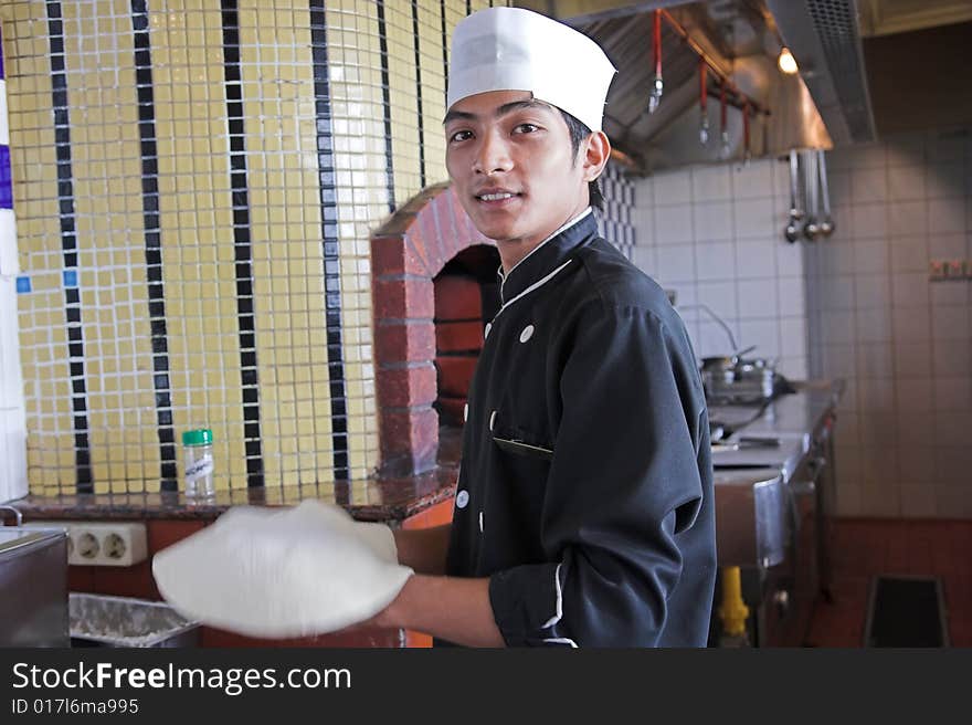 Chef Preparing or cooking pizza food. Chef Preparing or cooking pizza food