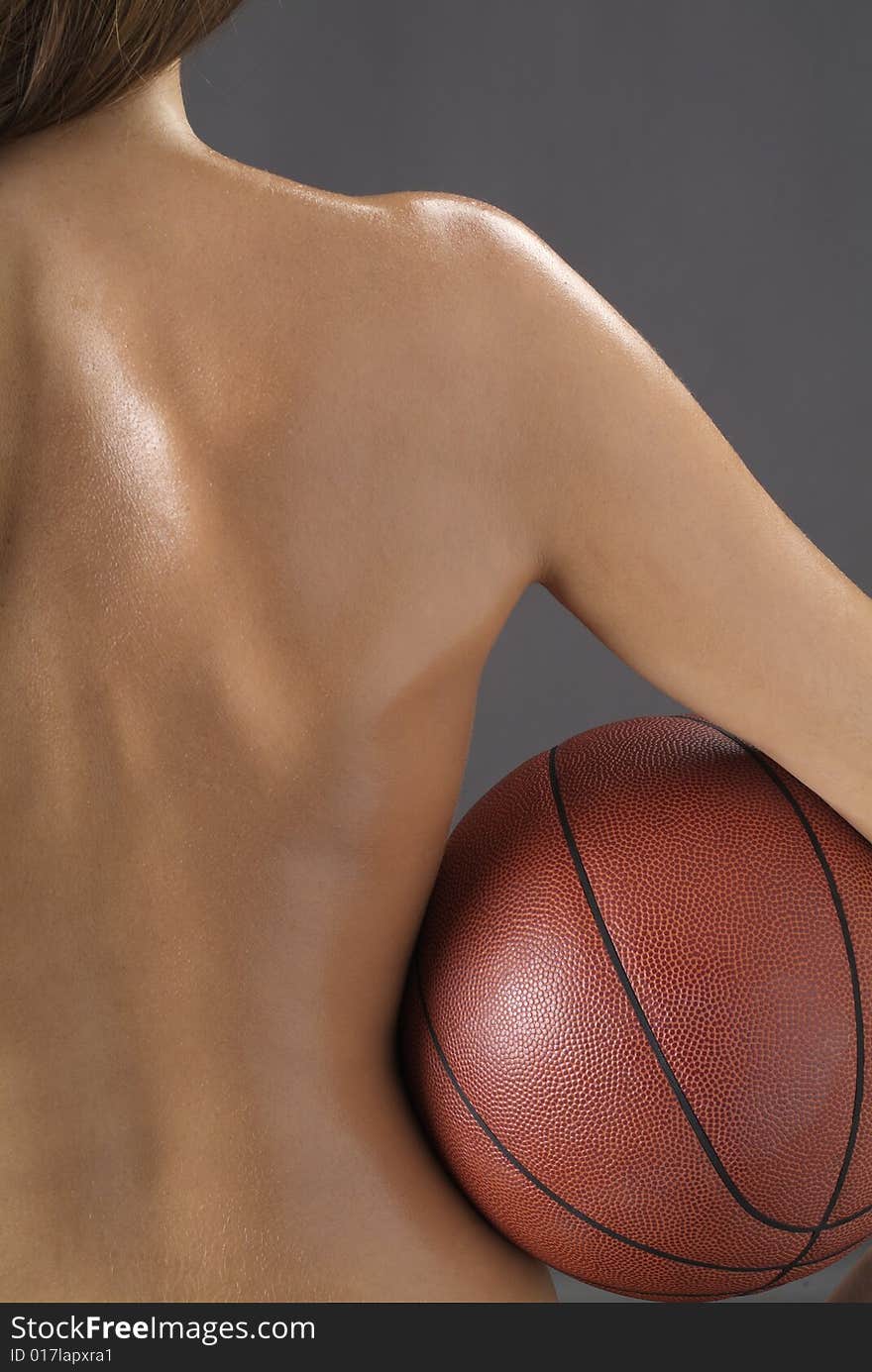 Nude young girl with basketball. Nude young girl with basketball