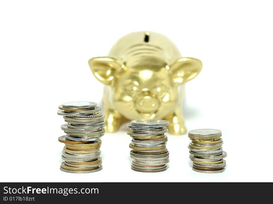 Piggy bank  isolated on white background with coins. Piggy bank  isolated on white background with coins