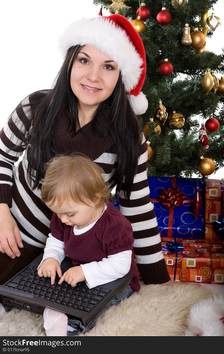 Happy mother and daughter over christmas tree. Happy mother and daughter over christmas tree