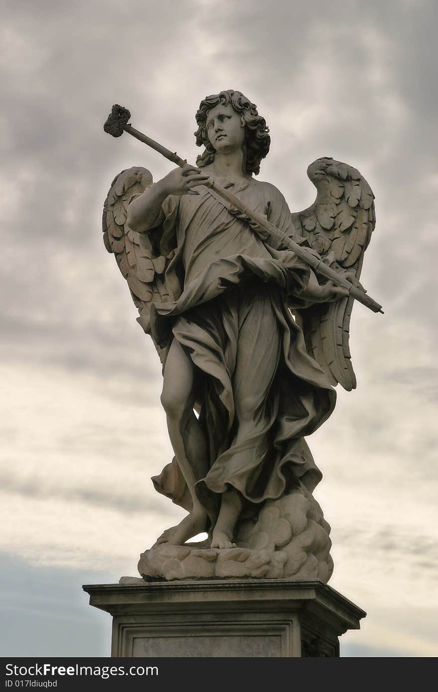 An ancient sculpture of angel located on San Angel bridge in Rome, Italy. An ancient sculpture of angel located on San Angel bridge in Rome, Italy.