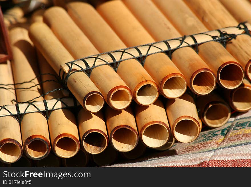 Pan flutes on a native blanket