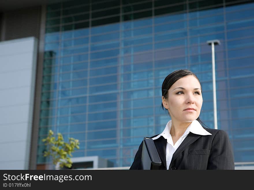 Attractive, successful brunette businesswoman outdoor