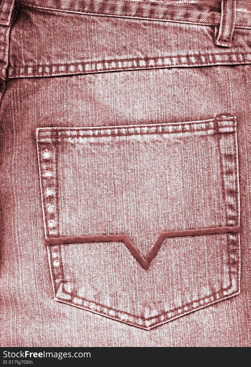 Close-up of old grey jeans pocket  to background