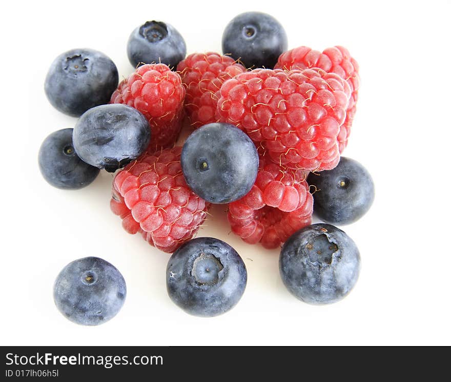 Raspberries and blueberries two delicious summer fruits