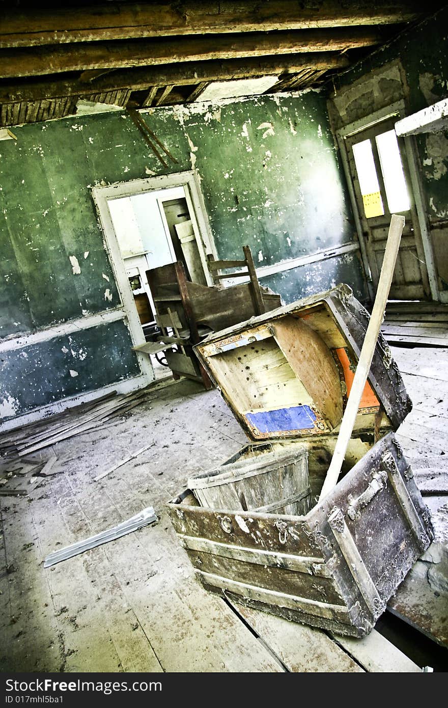 Abandoned house with old trunk