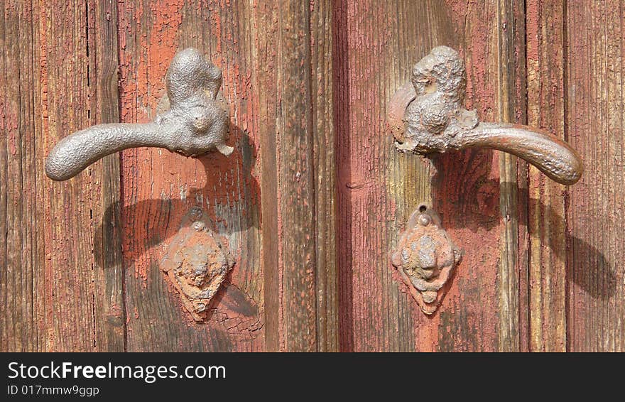 Old historical doors with original handle. Old historical doors with original handle