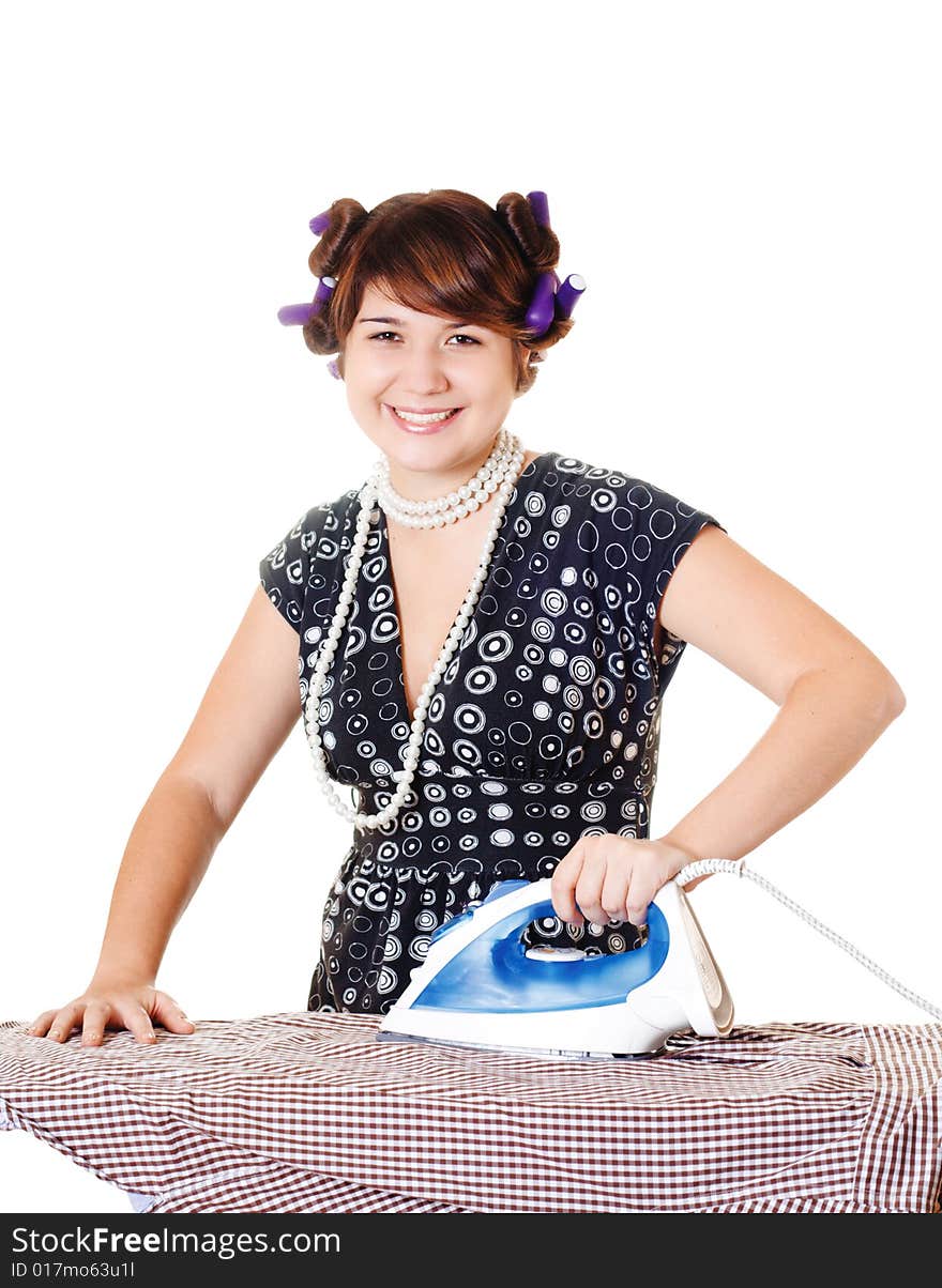 Smiling housewife is ironing a shirt on white background