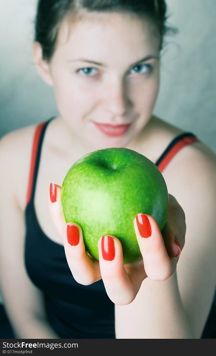 Girl with a green apple