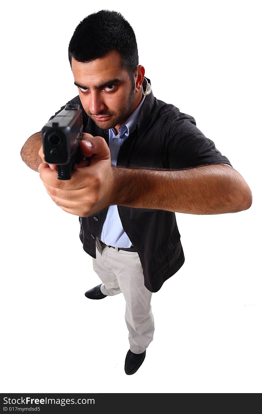 Man pointing gun at viewer with one eye eye shut