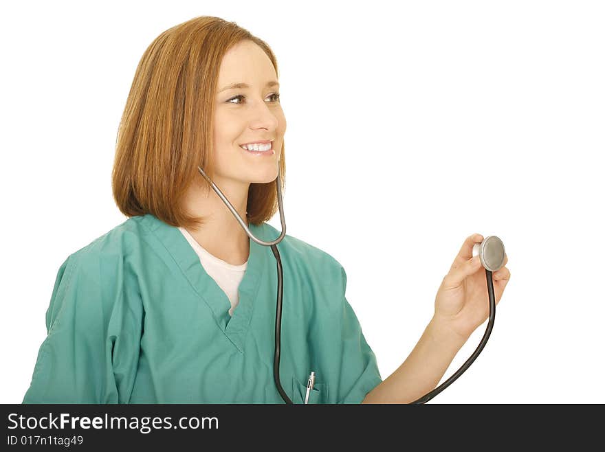 Shot of isolated woman holding up stethoscope to check on somebody. Shot of isolated woman holding up stethoscope to check on somebody