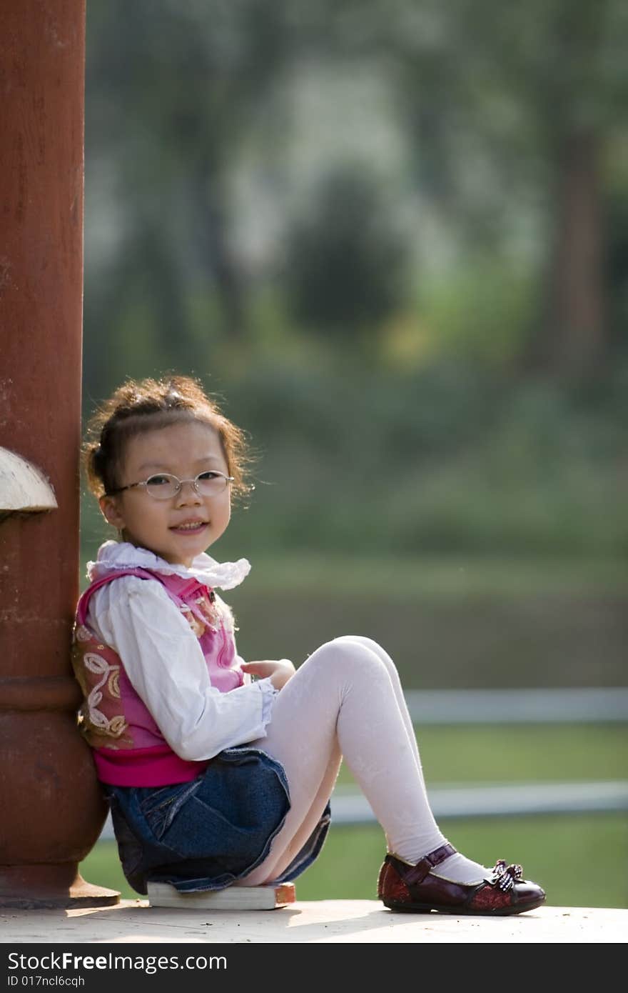 The girl read a book outside. The girl read a book outside.