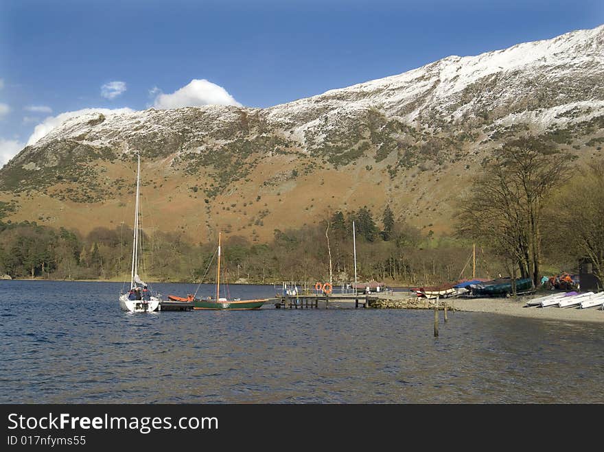 A young family going sailing in the lakes. A young family going sailing in the lakes