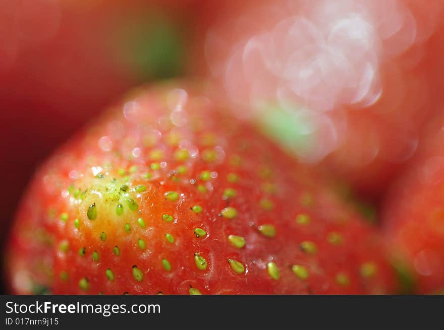 A macro image of a local Philippine strawberry. A macro image of a local Philippine strawberry.