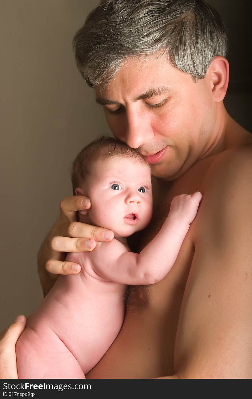 Father holding his daughter in his hands. Father holding his daughter in his hands