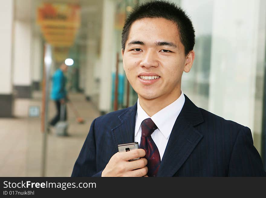 Man Standing In Office Building