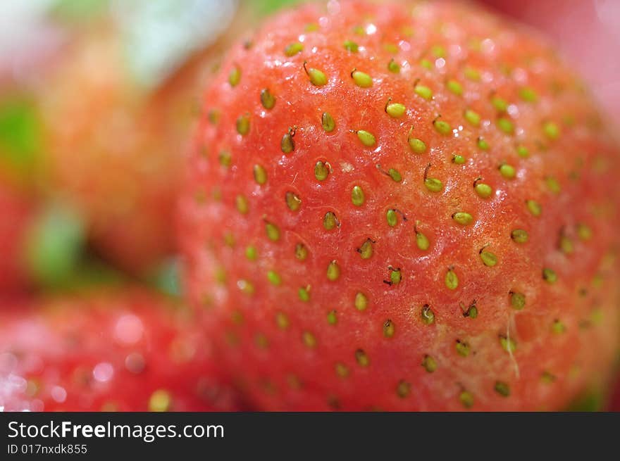 A macro image of a local Philippine strawberry. A macro image of a local Philippine strawberry.