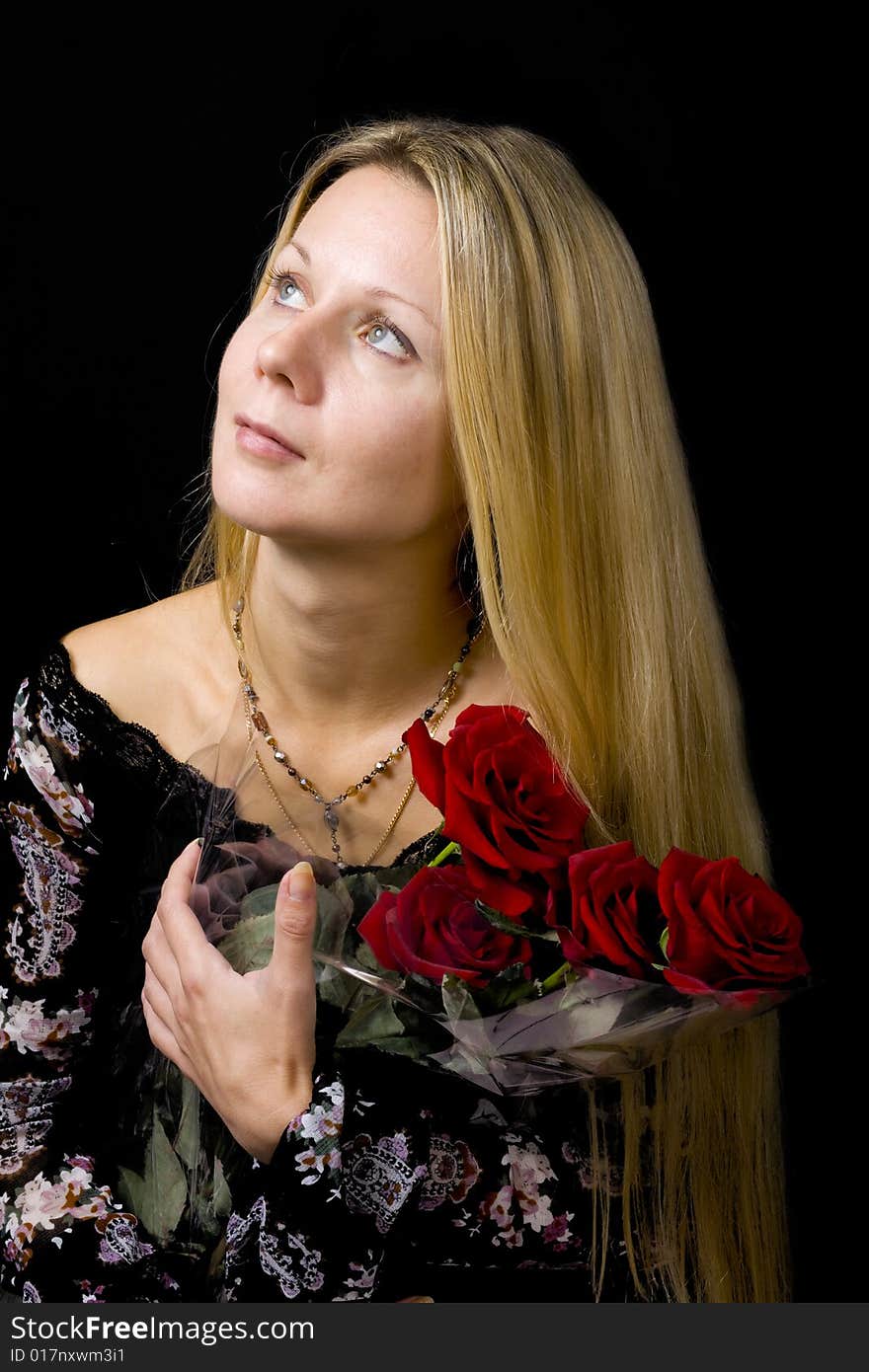 Long hair blonde woman with bunch of flowers. Long hair blonde woman with bunch of flowers