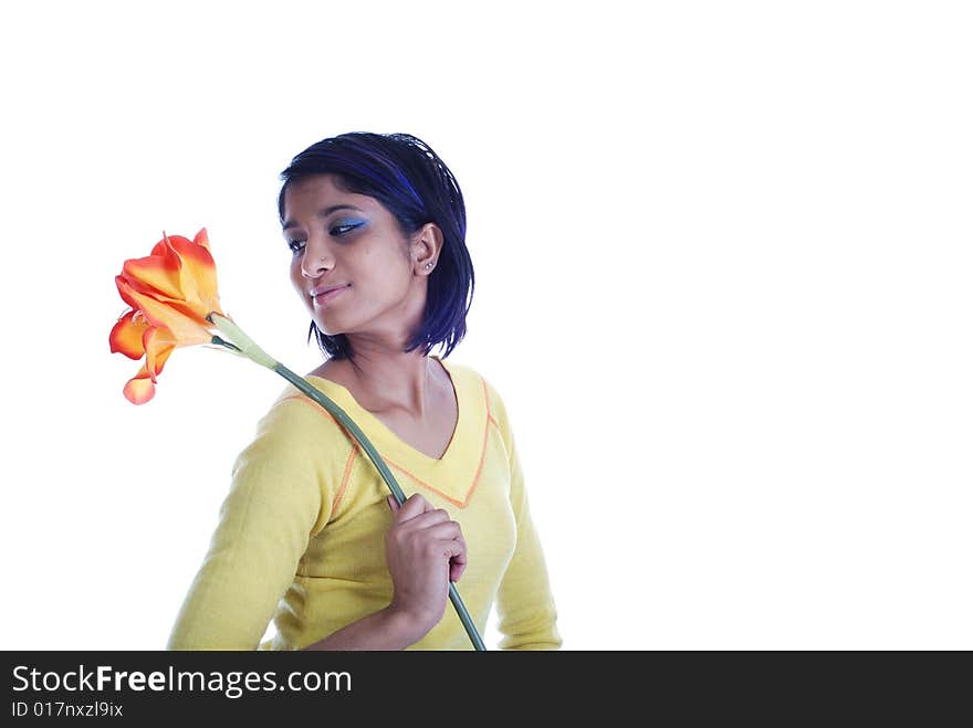 Picture of one girl and orange artificial flower on a white background. Picture of one girl and orange artificial flower on a white background