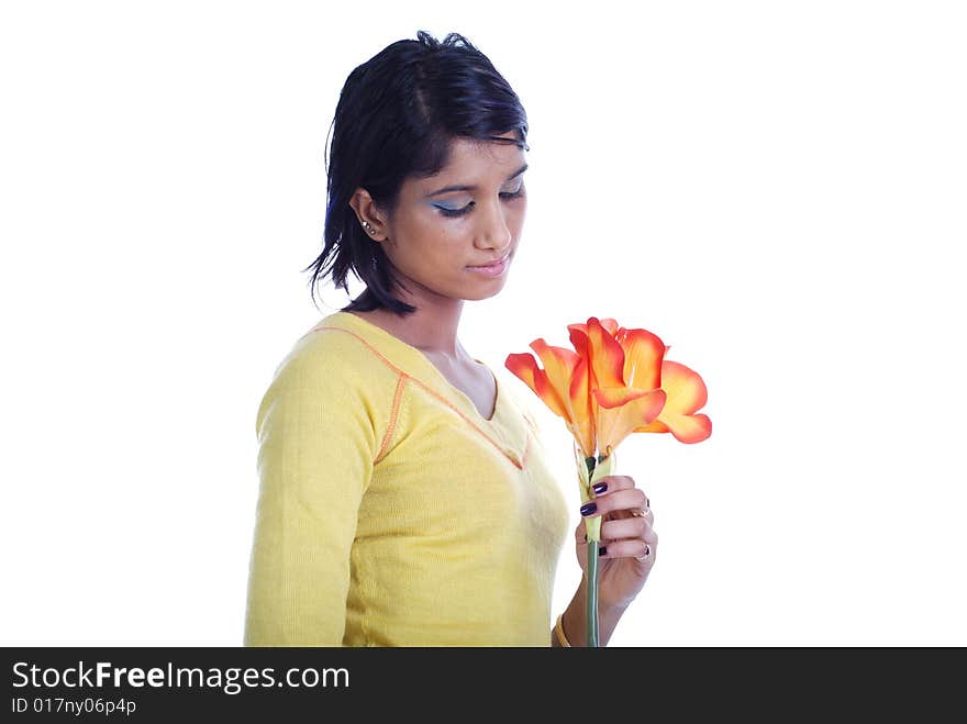 Picture of one girl and orange artificial flower on a white background. Picture of one girl and orange artificial flower on a white background