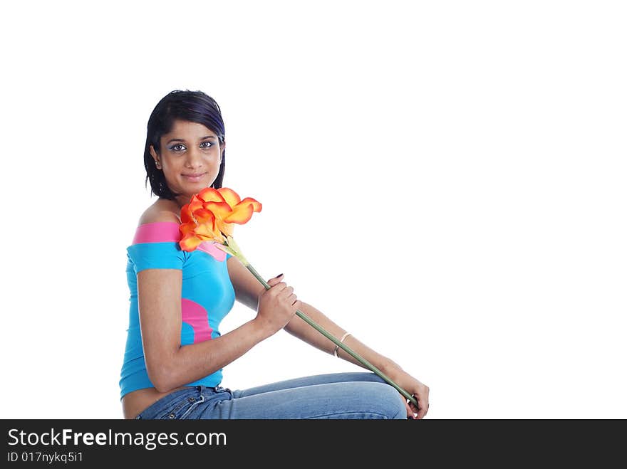 Picture of one girl and orange artificial flower on a white background. Picture of one girl and orange artificial flower on a white background