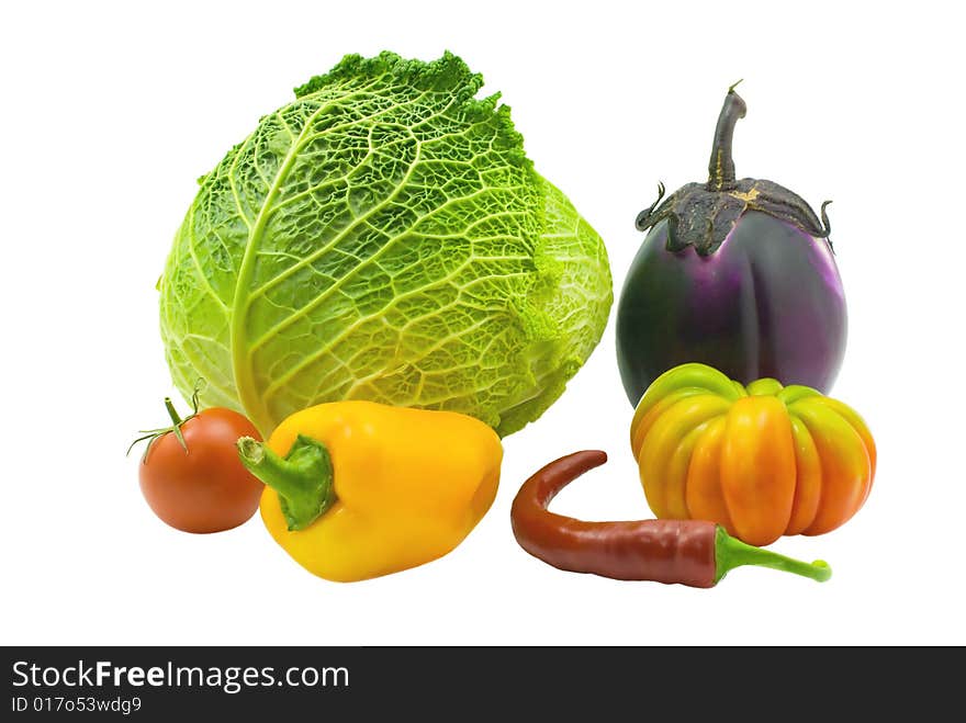 Autumn vegetables Isolated on a white background cabbage, an eggplant, pepper and tomatoes. Autumn vegetables Isolated on a white background cabbage, an eggplant, pepper and tomatoes