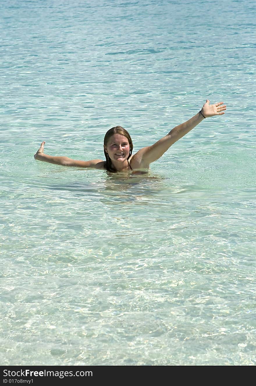 Girl in clear tropical water