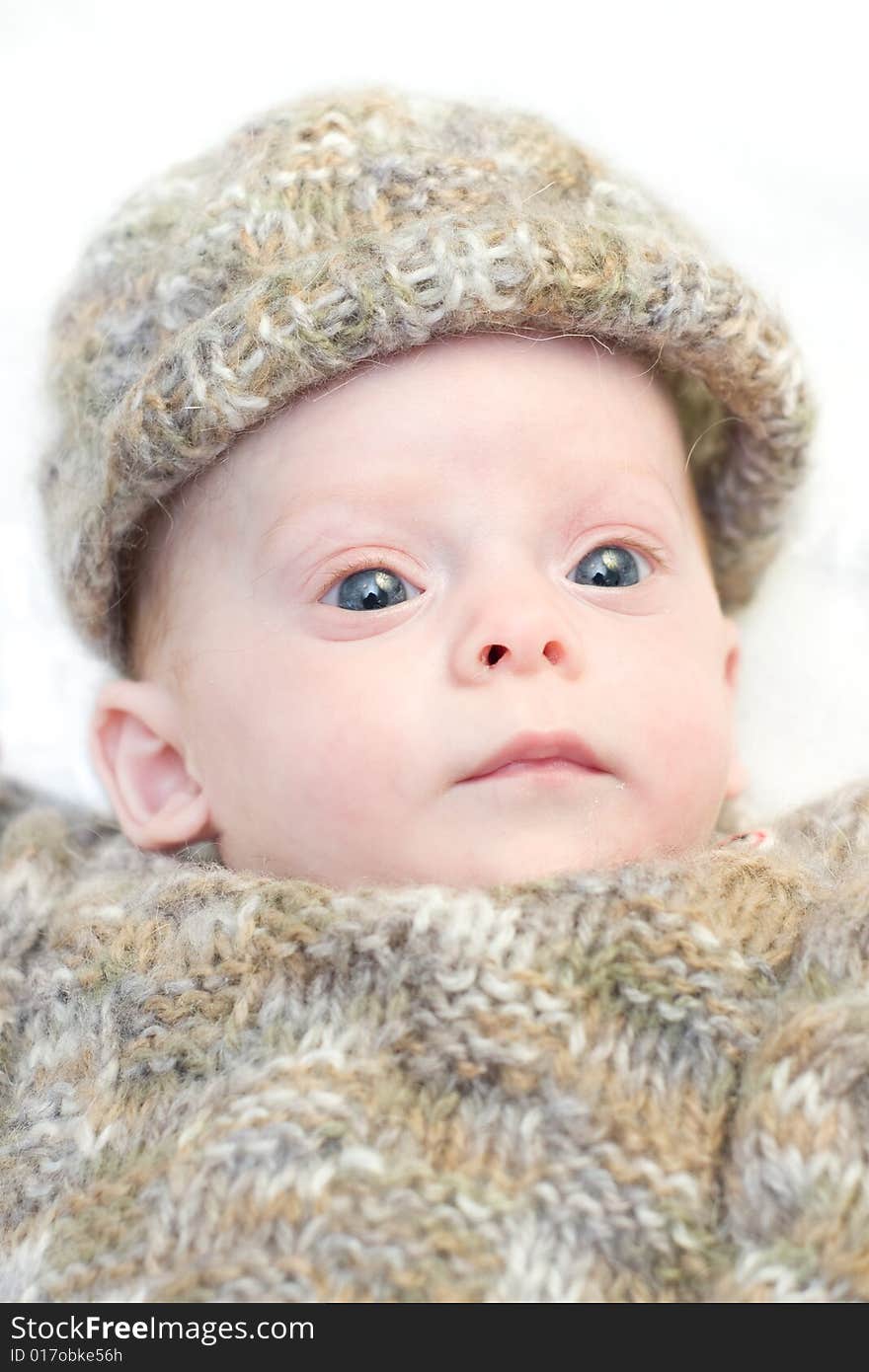 Newborn baby in winter clothes