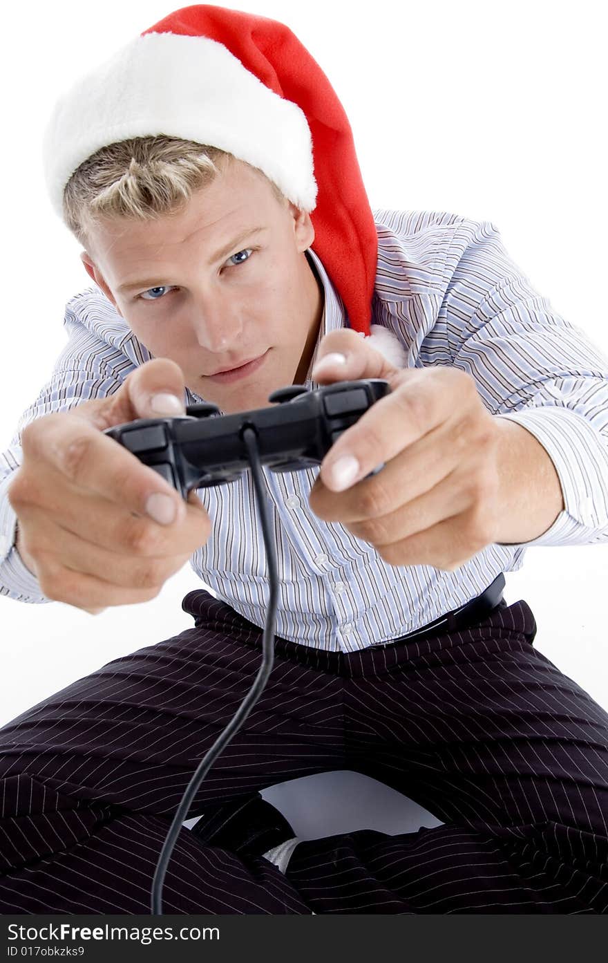 Caucasian man with remote and christmas hat with white background