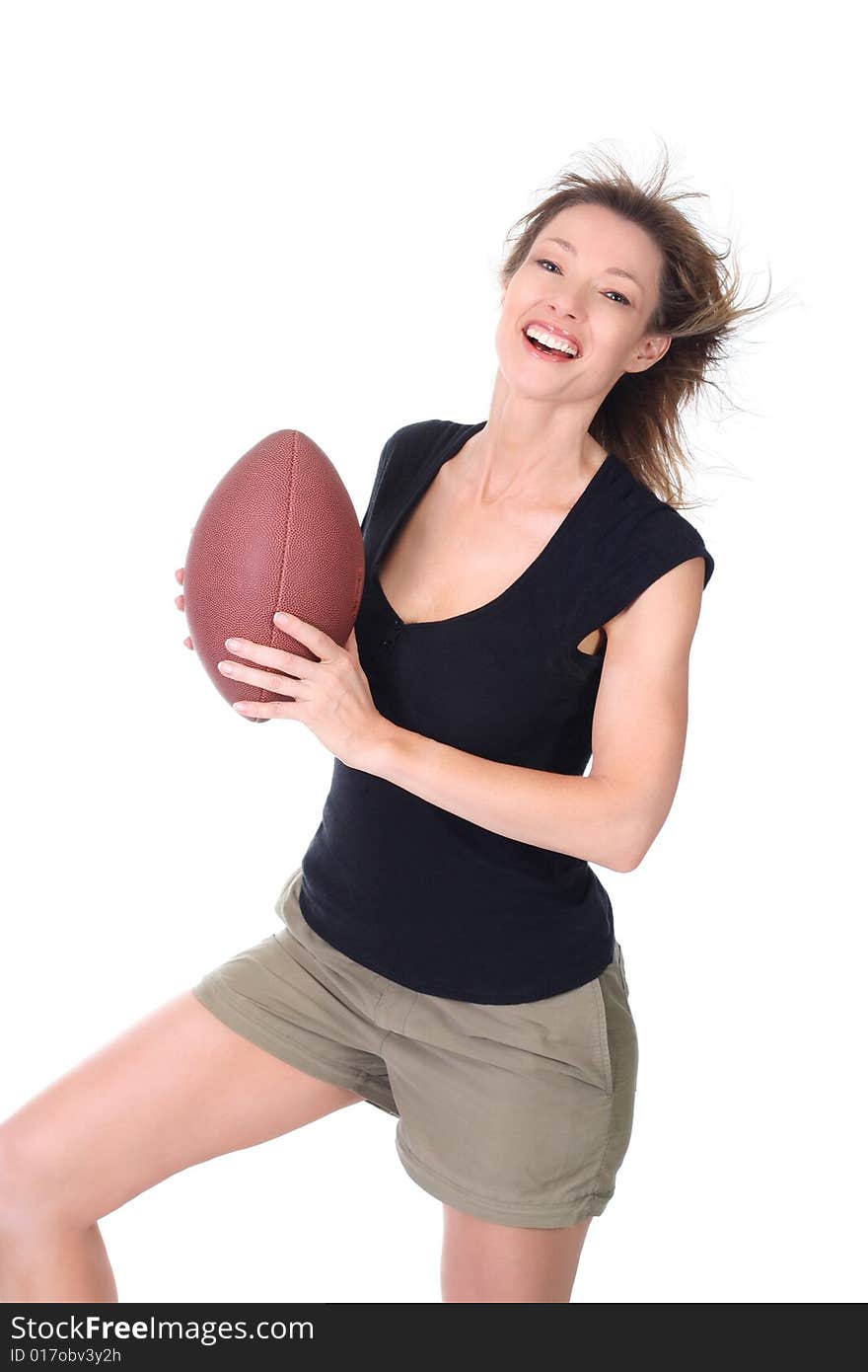 Woman with football isolated on white