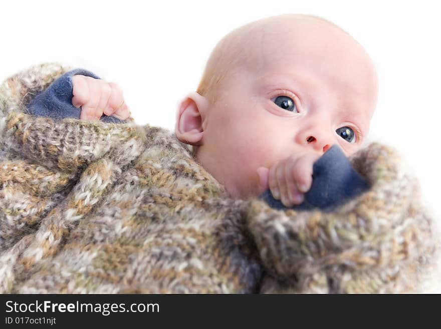 Newborn baby in winter clothes