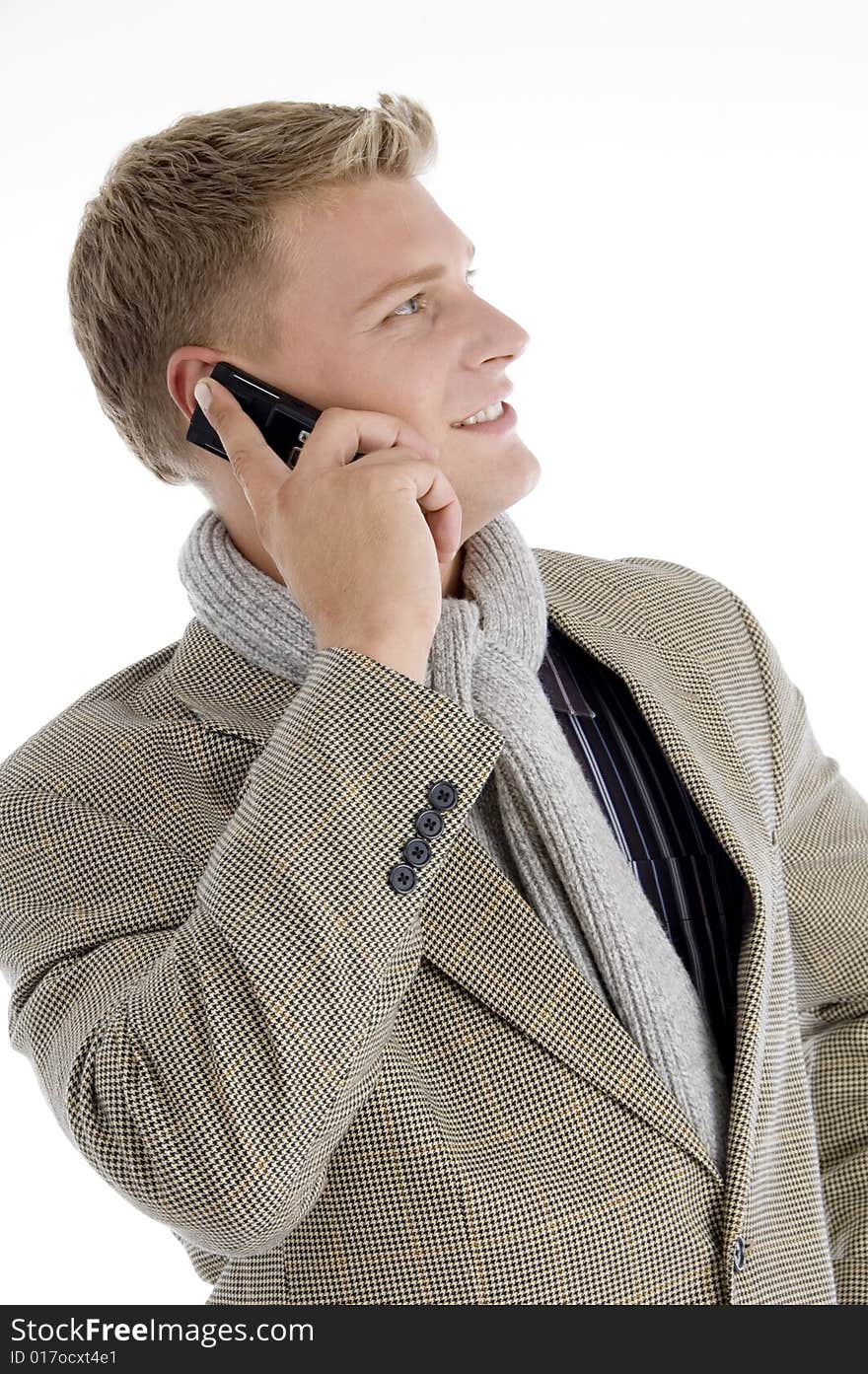 Smiling young caucasian interacting on mobile on an isolated white background