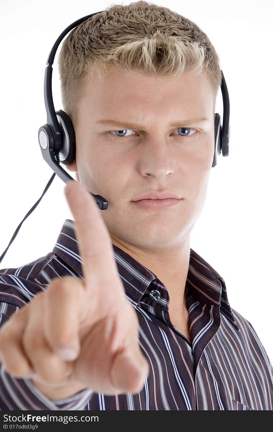 Male with headset showing his index finger